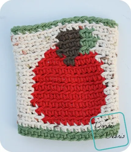 Learn to make an Apple Mug Cozy from a free crochet pattern by DivineDebris.com