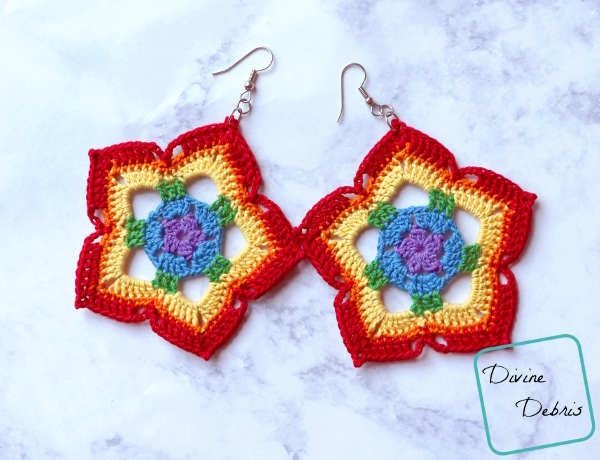 Learn how to make rainbow mini mandal crochet earrings from a free pattern by DivineDebris.com