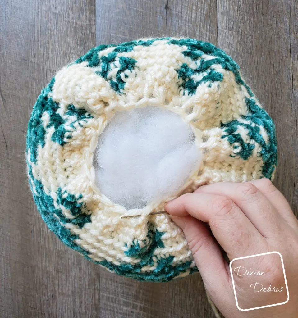 Learn to make the Pretty in Gingham Pumpkin from a free crochet pattern by DivineDebris.com