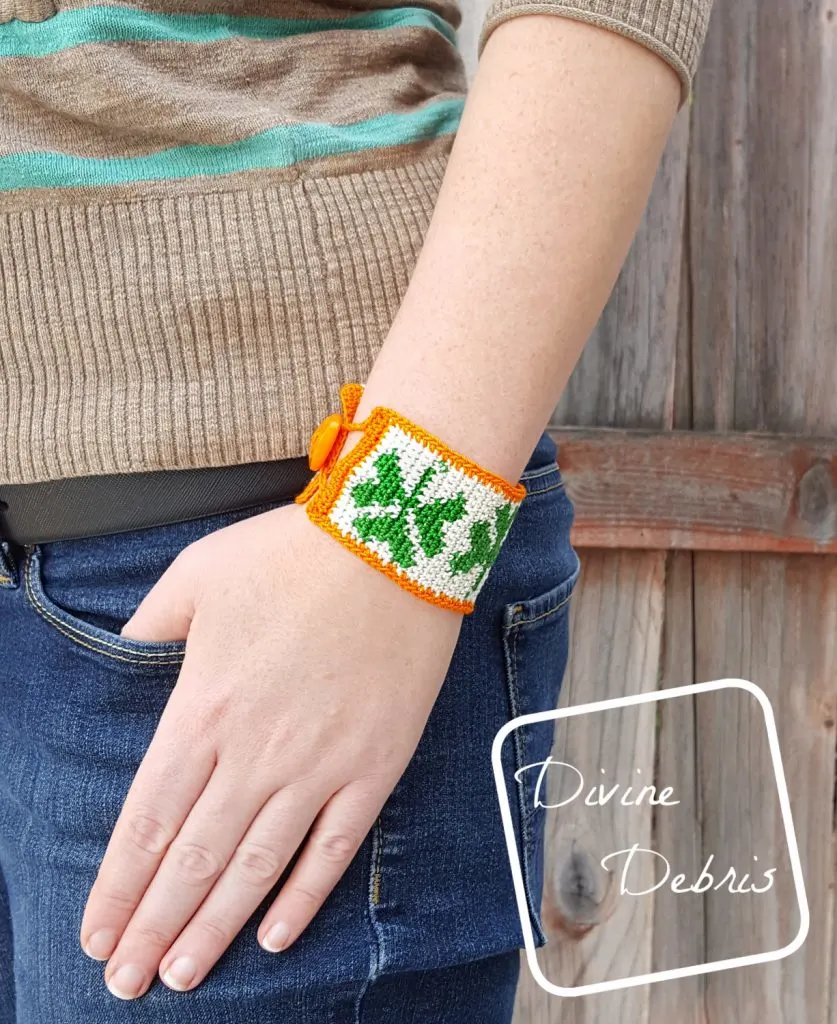 You won't get pinched on St. Patrick's Day when you learn to make this fun tapestry crochet Shamrock Bracelet from a free pattern on DivineDebris.com
