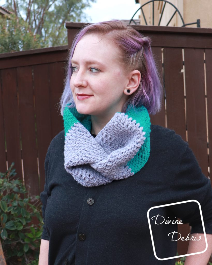 Learn how to make the Whitney Cowl, a design that combines the linen stitch, a simple puff stitch, and finished with a twist, from a free crochet pattern on DivineDebris.com