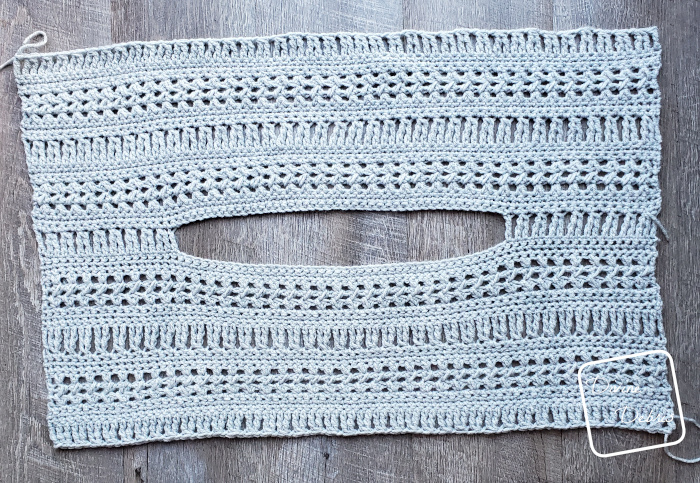 An in progress photo of the Stephanie Sweater crochet pattern by DivineDebris.com