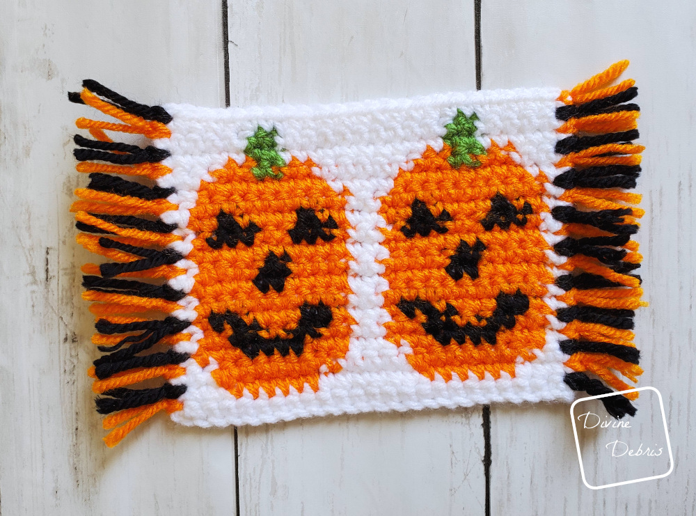 Learn to make the Cute Pumpkins Mug Rugs from 2 free tapestry crochet patterns by DivineDebris.com
