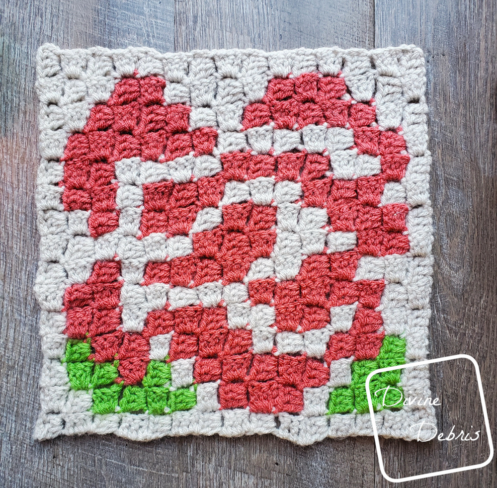 [image description] Rose Afghan Square laying flat
