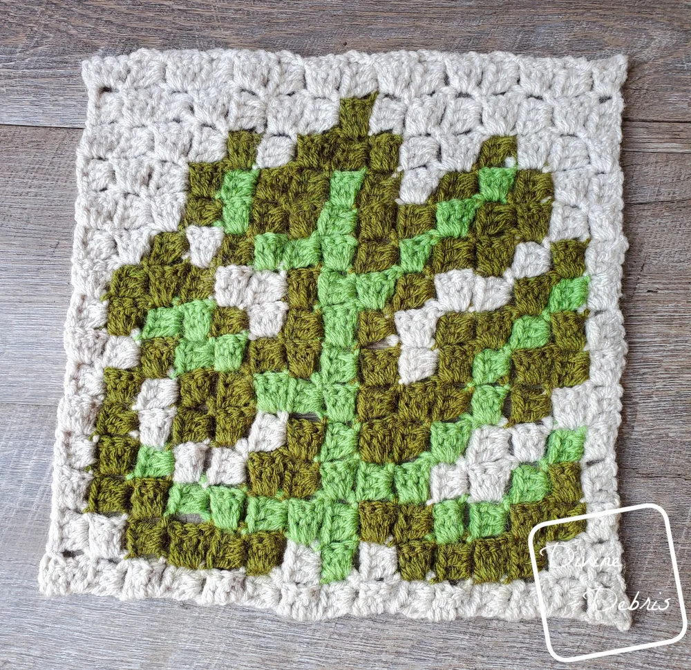 [Image description] C2C Monstera Leaf Afghan Square in the center of the photo