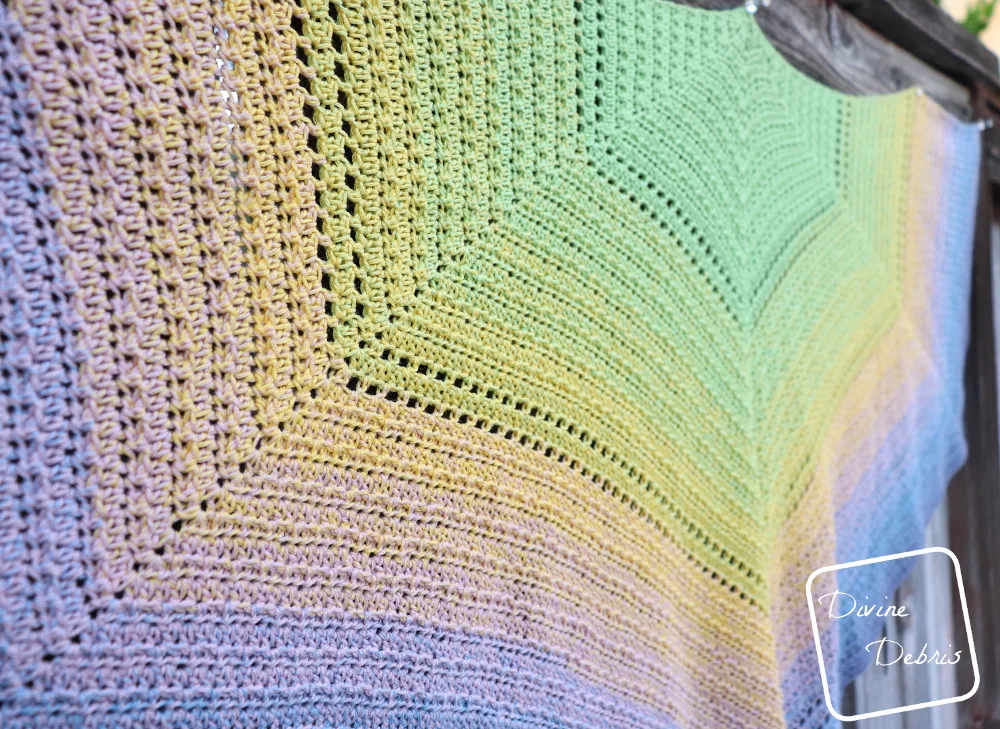 [Image description] Close up of the Alix Shawl from the left side, where the rest fades off in the distance