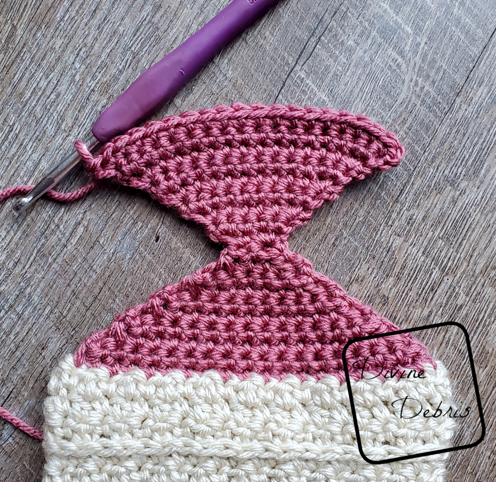 [Image description] Photo 1 of 2 showing how to seam the Heel portion of the Kieran Stocking crochet pattern by Divine Debris. This photos shows the hourglass shape.