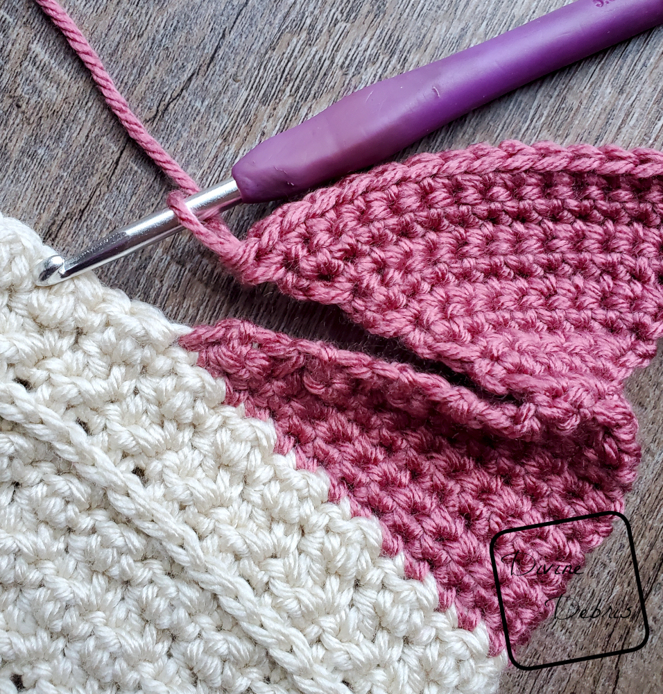 [Image description] Photo 1 of 2 showing how to seam the Heel portion of the Kieran Stocking crochet pattern by Divine Debris.
