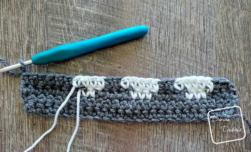[Image description] Close up shot of Rows 1 - 4 of the Gloria Ghost Scarf crochet pattern.