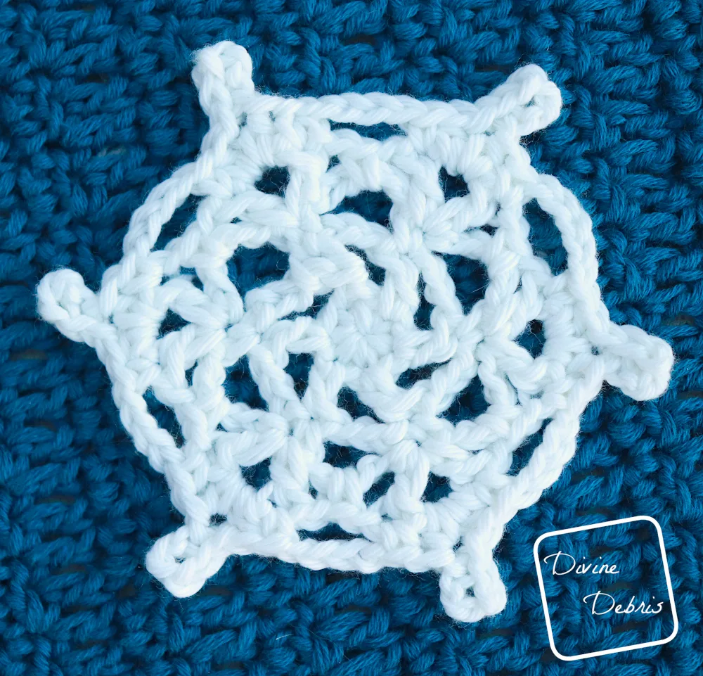 [Image description] Close up of Snowflake Applique 3 of the Crystal Snowflakes Shawl