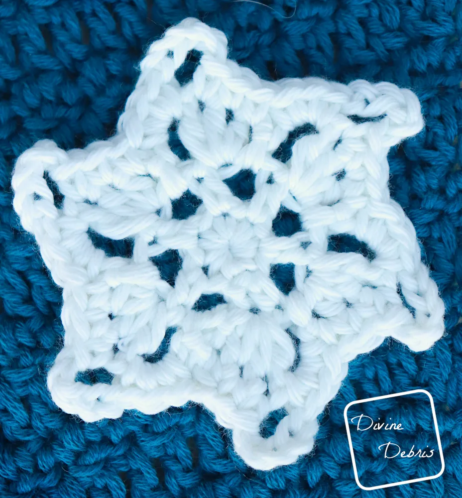 [Image description] Close up of Snowflake Applique 1 of the Crystal Snowflakes Shawl