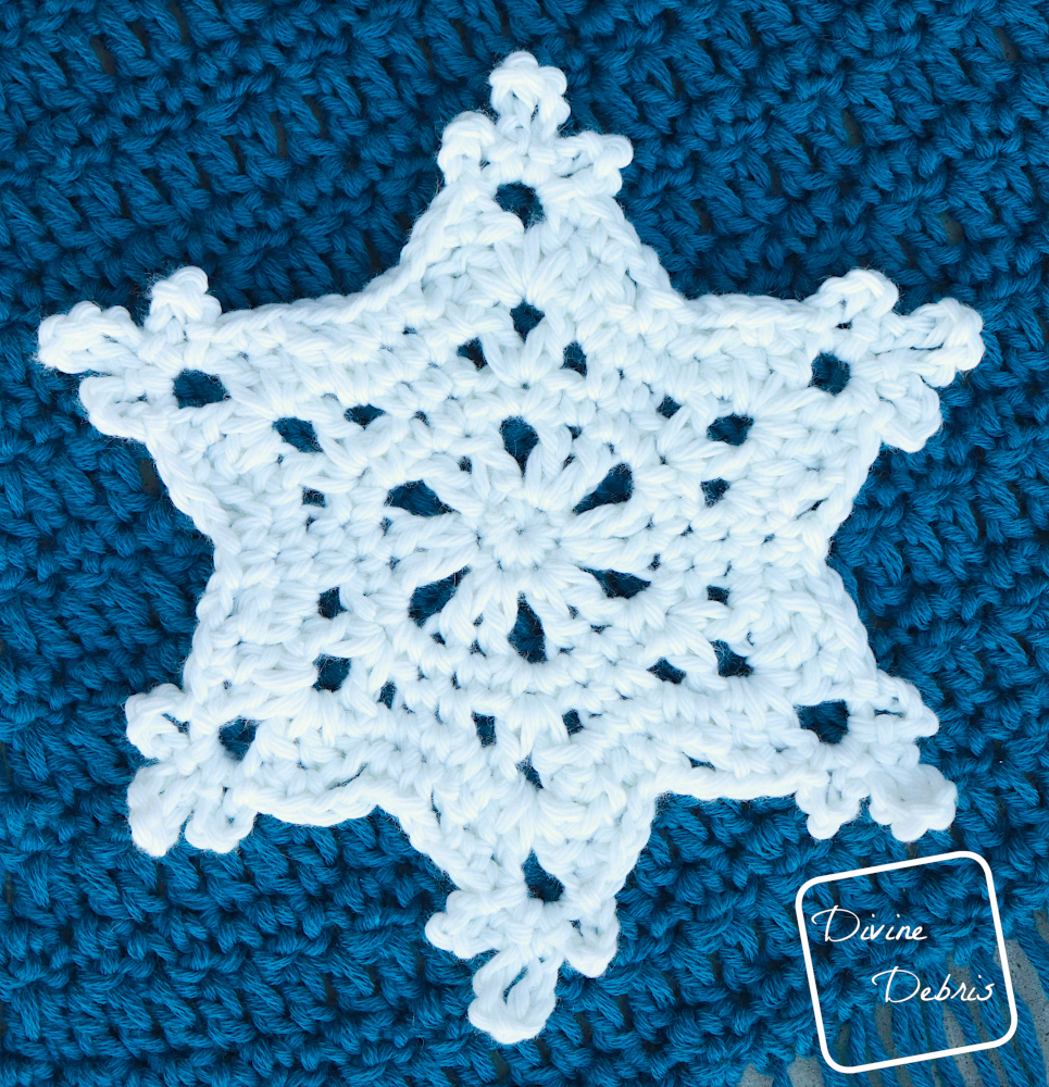 [Image description] Close up of Snowflake Applique 2 of the Crystal Snowflakes Shawl
