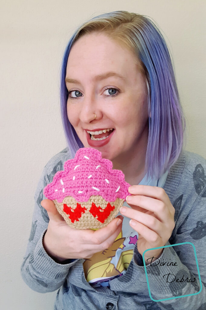 Learn to make a fun and silly Valentine's Day inspired crochet cupcake amigurumi, the Sweetheart Cupcake Ami, from a free crochet pattern 