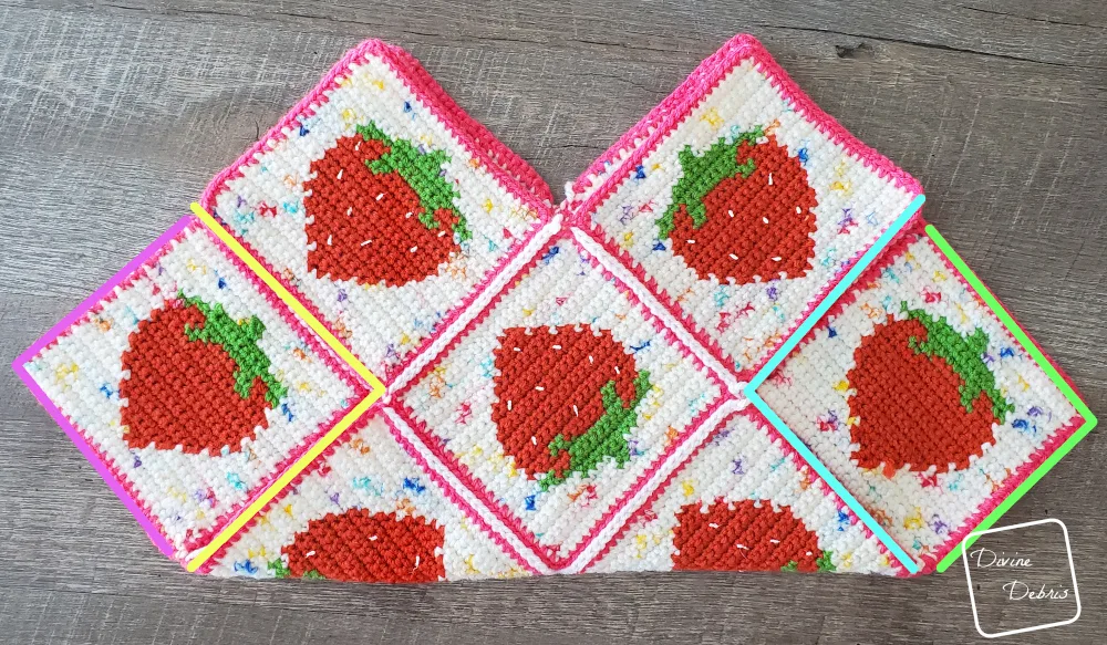 [Image description] Cute Strawberry Bag assembly photo 3 - the 10 squares have been folded in half for further seaming.