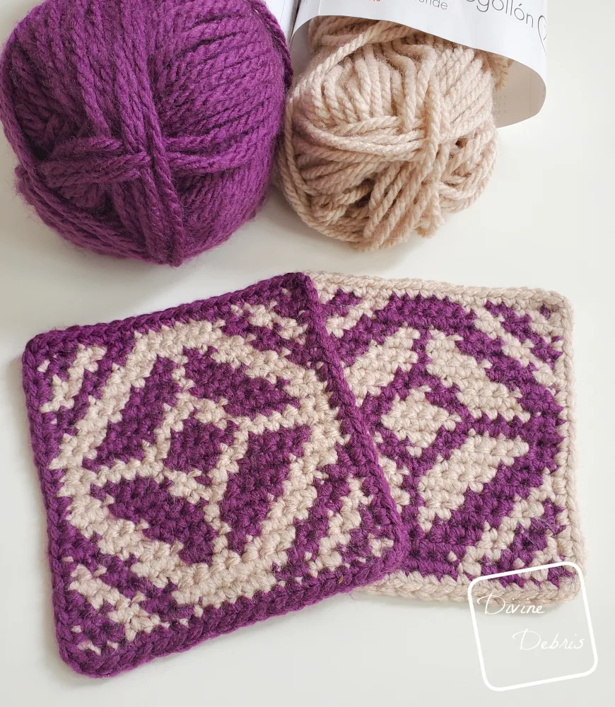 [image description] top down look at 2 Darling Diamond Square crochet designs on a white background, with skeins of yarn at the top of the photo