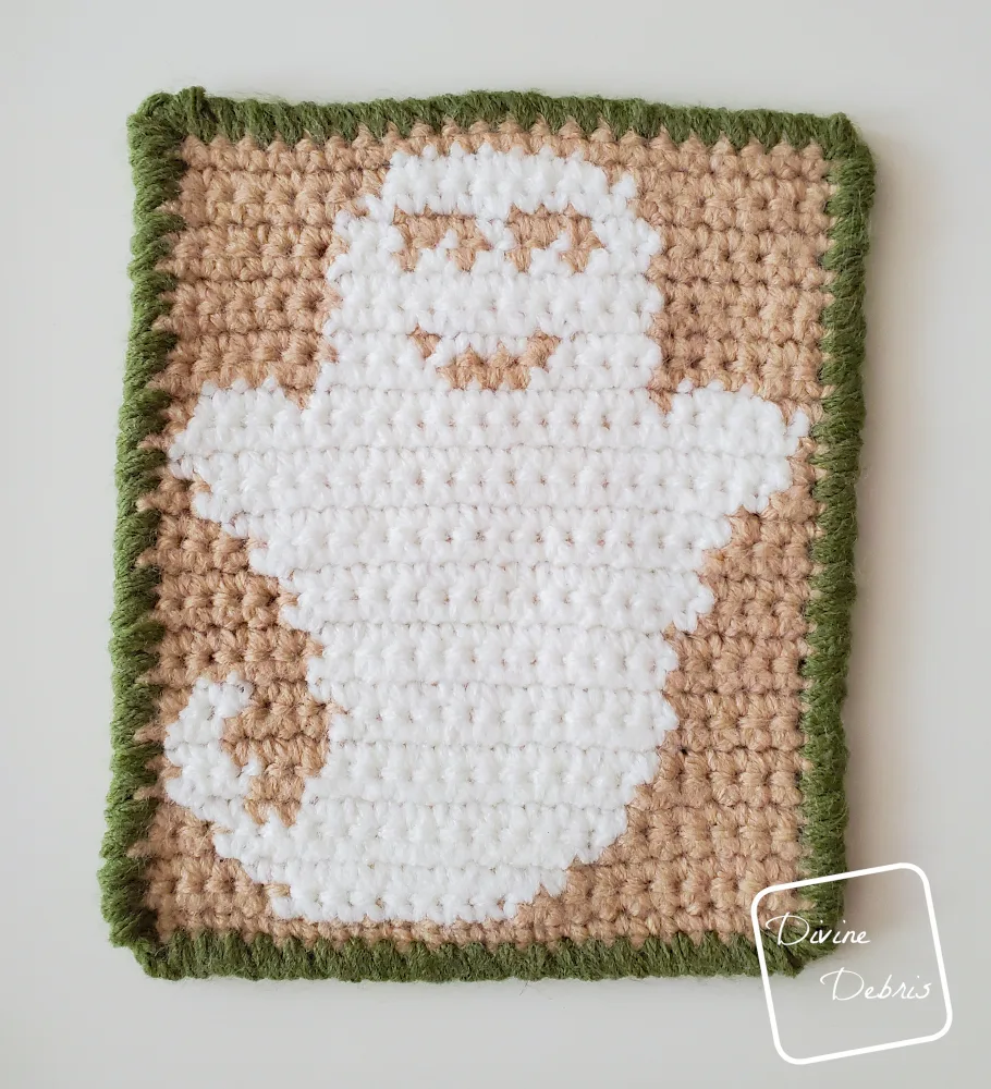 [Image description] Top down look of the right side of the tan and white Cute Ghost Coaster crochet pattern.