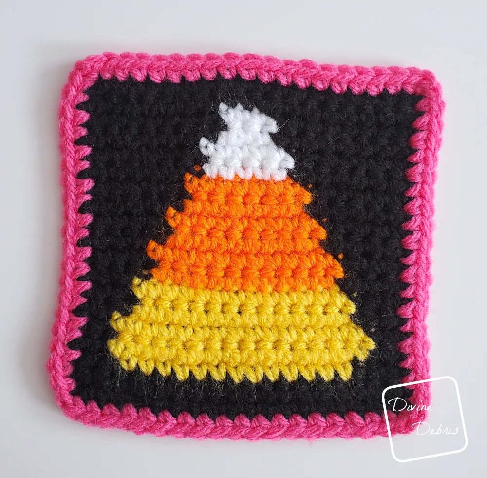 [Image description] Top down view of the Candy Corn Halloween Square on a white background