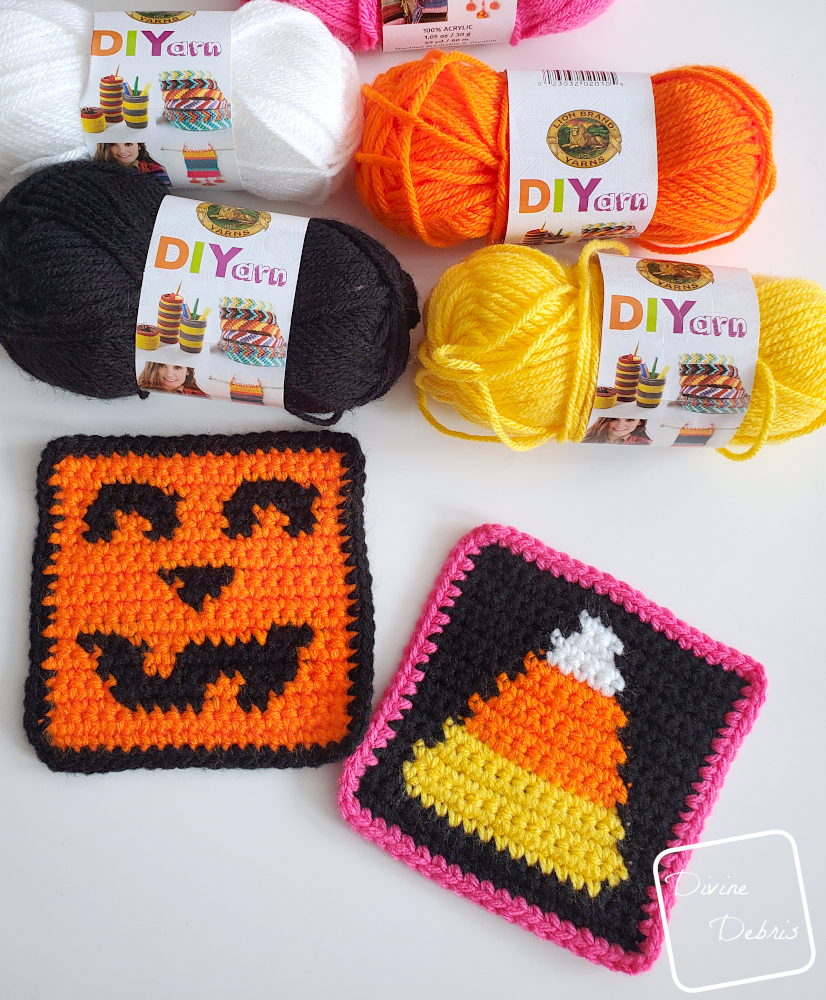 [Image description] Candy Corn and Jack O'Lantern Halloween Squares laying on a white background with skeins of yarn along the top of the photo.