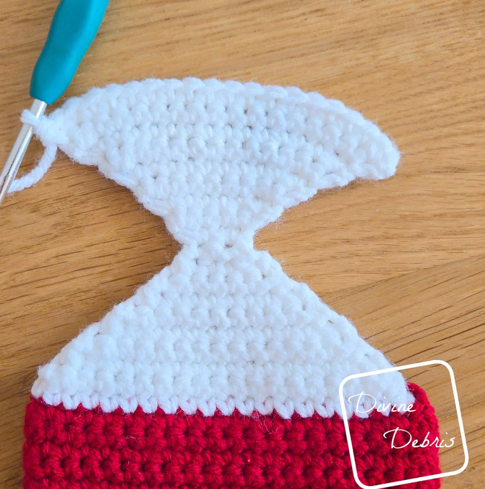 [Image description] Step 1 of the Heel Seaming for the Twinkle Toes Reindeer Stocking - it resembles a hourglass