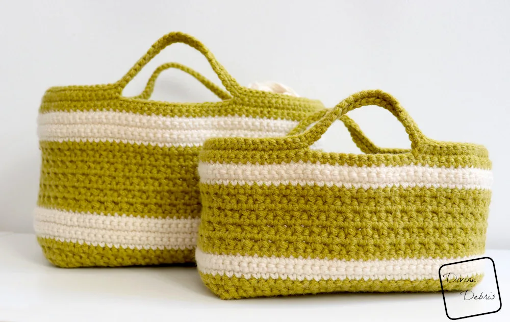 [Image description] The smaller Handle On Life Basket sits in front of the larger Handle on Life Basket against a white background on a white counter. 