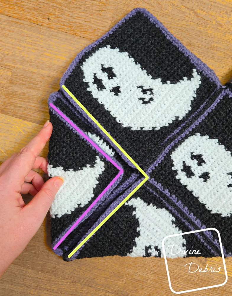 [Image description] Gwendoline Ghost Bag assembly photo 5 - close up on how to fold the left-hand side.