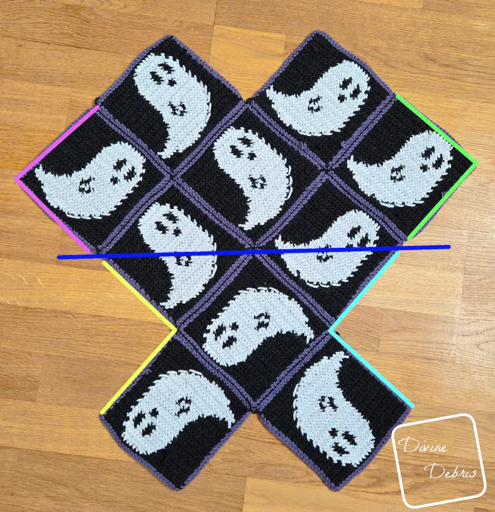[Image description] Gwendoline Ghost Bag assembly photo 2 - all 13 squares are seamed and are laying on an wooden background, color coded for where to seam next.