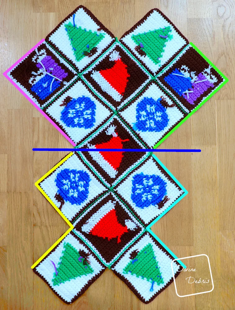 [Image description] Patchwork Christmas Bag assembly photo 1 - all 13 squares are seamed and are laying on an wooden background