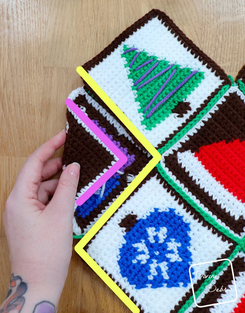 [Image description] Patchwork Christmas Bag assembly photo 5 - close up on how to fold the left-hand side.